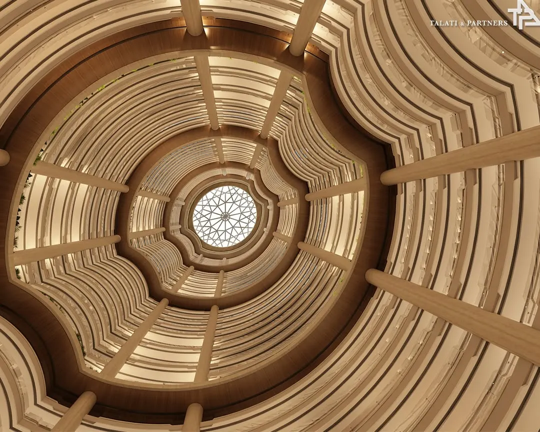Looking up through the central atrium of Palais Royale, one of India’s tallest residential towers. This 215-meter vertical space is an engineering marvel that bathes the interiors in natural light, creating a sense of immense scale and spatial harmony.