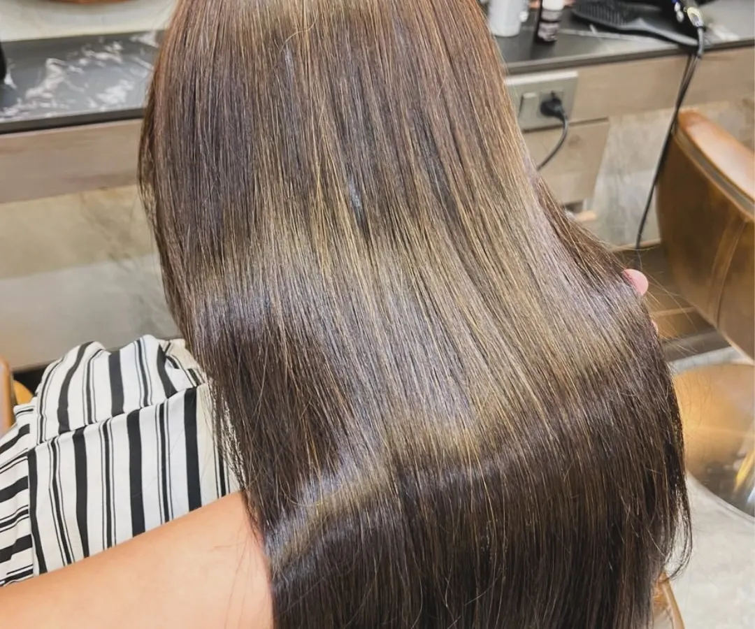 This is the magic of our Hair Botox treatment. We take hair that's tired from daily styling and transform it into this incredibly smooth, glossy, and healthy-looking mane. It's the perfect foundation for any bridal hairstyle.