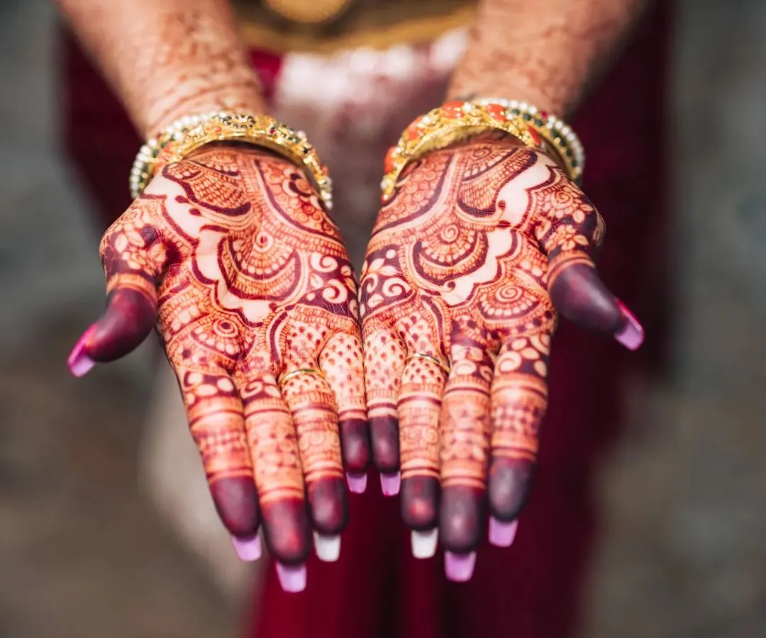 The result of my all-natural henna paste is this stunning, deep maroon stain. I am very particular about using high-quality ingredients to ensure a rich and long-lasting color for your special day.