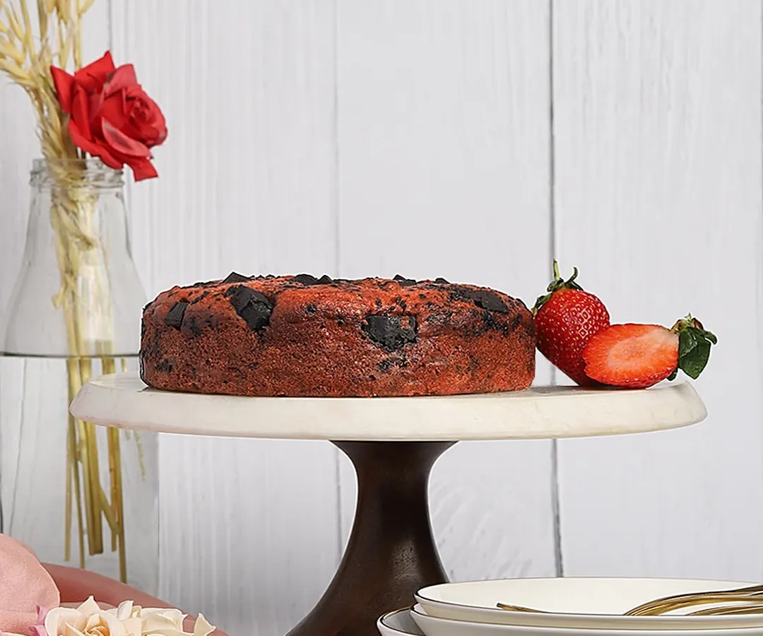 This is my all time bestseller, the Strawberry Dark Chocolate cake. It’s completely eggless, butter-free, and sugar-free. I always suggest heating it for a few seconds before eating, it truly feels like heaven.