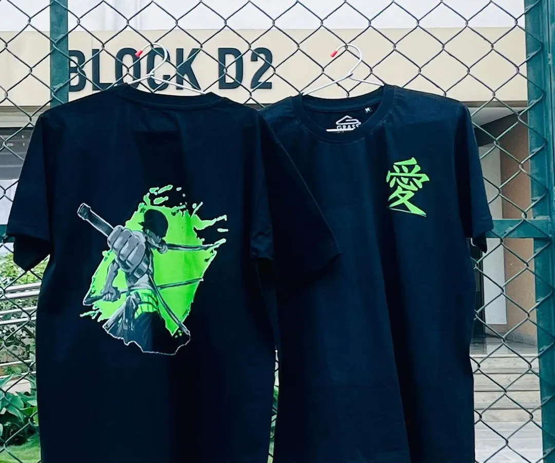 This is one of my favorite custom T-shirt orders, featuring a vibrant anime design. I offer printing on both the front and back, so you can have a small detail like the Japanese symbol for "love" on the front and a full graphic on the back, as shown here.