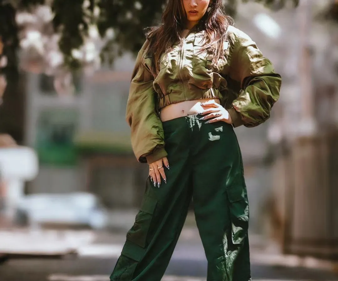 Capturing the raw energy of Bangalore's streets is one of my specialties. This is a full-body shot from a street style portfolio session, showcasing a confident pose and an outfit that blends modern trends with personal style.