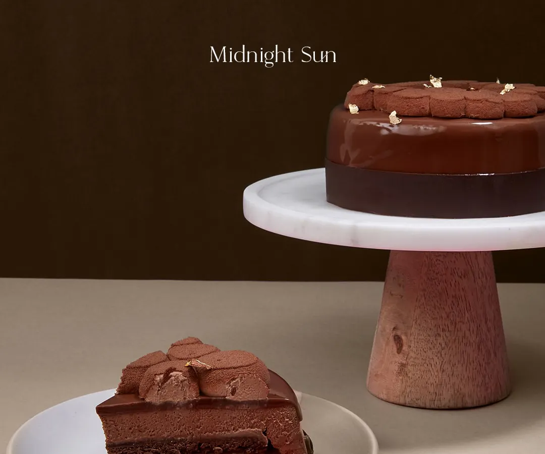 I created the Midnight Sun for true lovers of chocolate and caramel. It's a composition of deep, rich chocolate mousse and a silky, slow-cooked caramel core. This is indulgence, pure and simple.