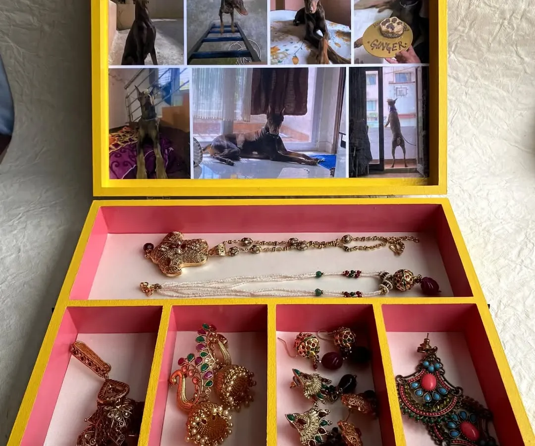 This custom jewelry box was a special wedding gift, personalized with a collage of the bride's beloved pet, Ginger. I love creating these organizer boxes because they hold not just jewelry, but precious memories too.