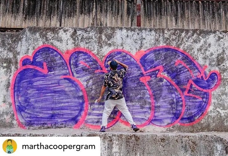 Here I am in action in Mumbai's Marol district, a spot we love to paint. This shot was captured by the legendary photographer Martha Cooper while I was laying down a big purple and pink throw-up. It’s always an honor to be documented by the best.