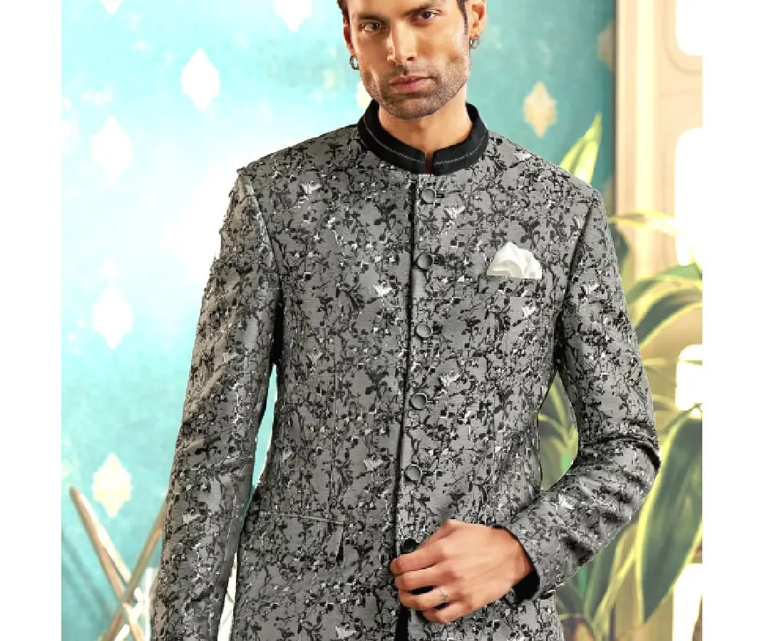 Modernity meets majesty in this textured grey bandhgala. We designed this piece with sharp, clean lines and a tailored fit, perfect for a sophisticated reception or sangeet look that commands attention with quiet confidence.