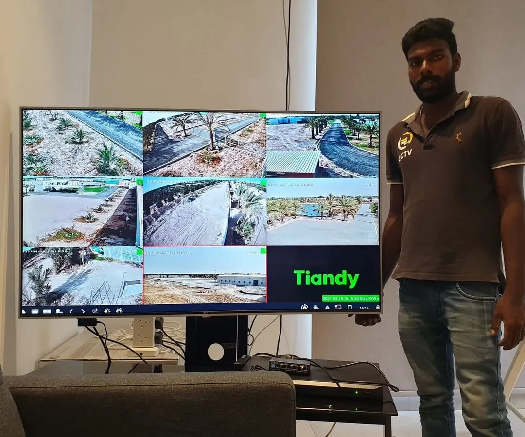 After installation, I make sure you can see everything clearly. This is a multi-camera setup on a large screen, showing the clear, wide coverage from a Tiandy PTZ camera system.