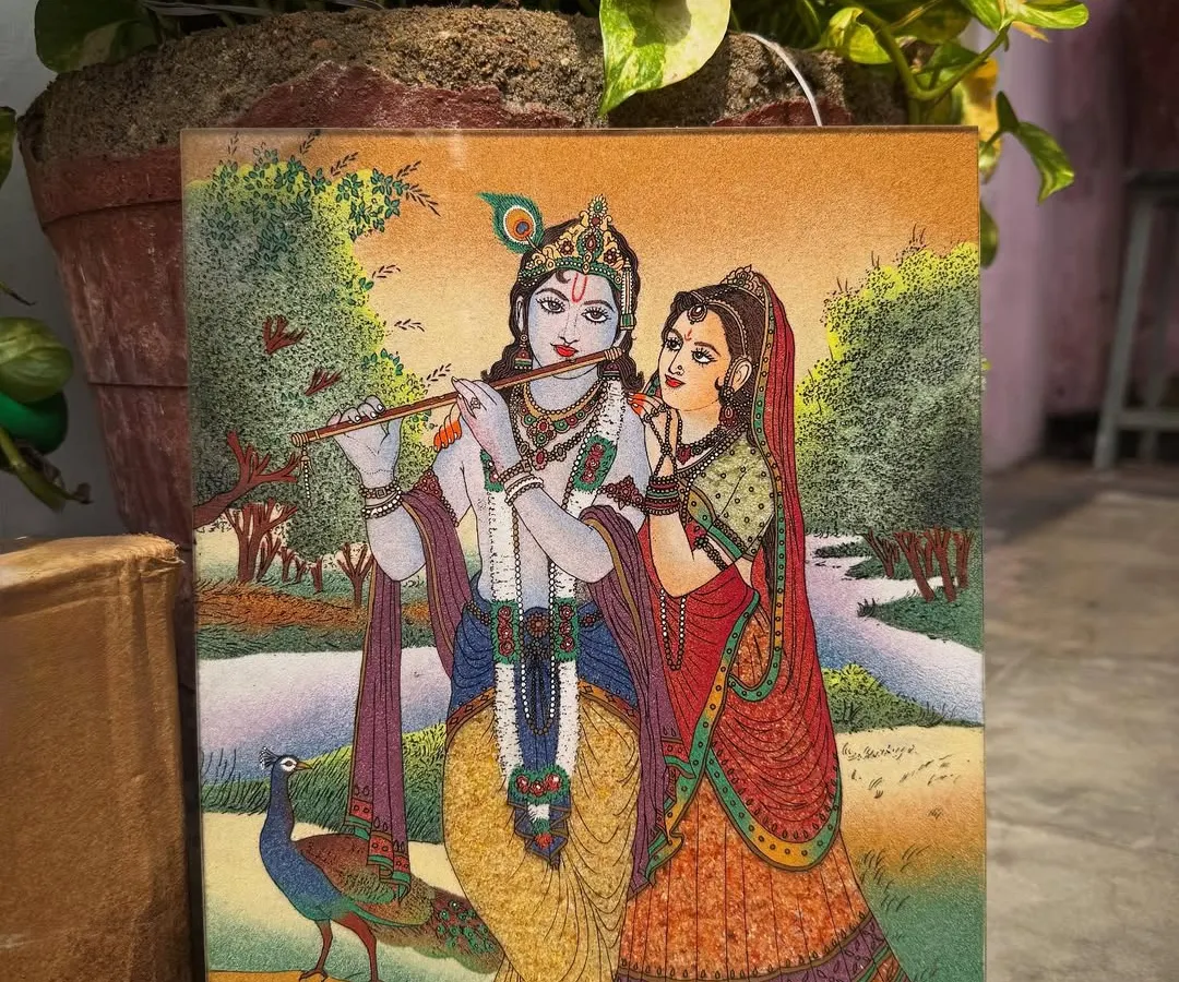 The eternal love between Radha and Krishna is brought to life with shimmering gemstones. This piece is designed to radiate harmony and devotion, making it a perfect centerpiece for a living room or a sacred addition to your pooja space.