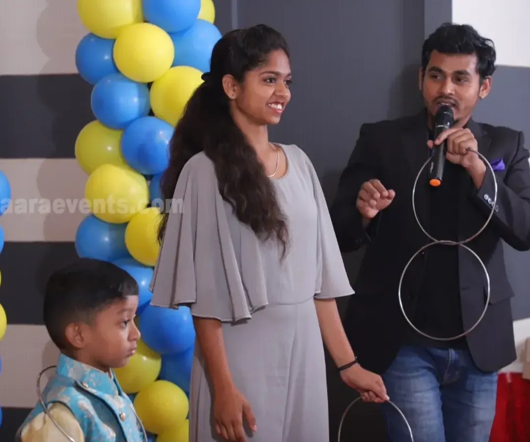 I'm performing the classic linking rings illusion with help from the audience. This trick is always a favorite and works great for mixed crowds at family gatherings, corporate events, or private parties.