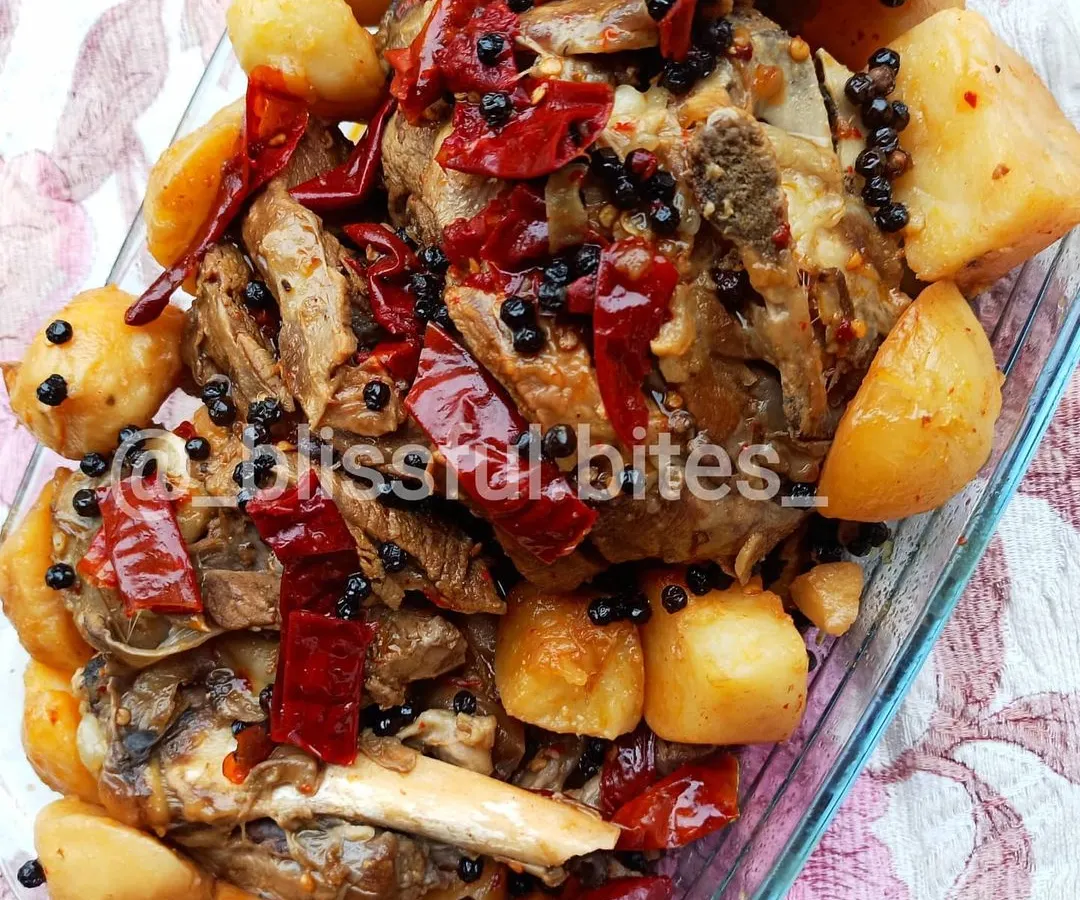 My showstopping Lamb Roast, slow-cooked until tender and served with roasted potatoes and aromatic spices. It's a perfect centerpiece for a special family dinner or festive gathering.