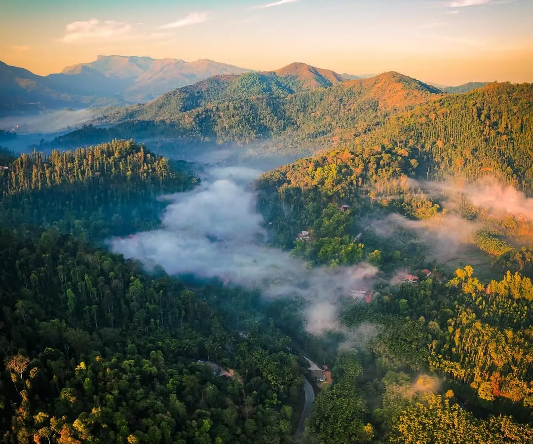 The Western Ghats near Kalasa, shrouded in morning mist. Last year's road trip was a whirlwind, but this year we took our time, soaking in the serene natural wonders of Hornadu.