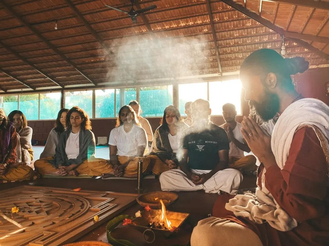 Here, we gather for a fire ceremony, a sacred ritual to purify the mind and set intentions. The rising smoke carries our prayers, and the warmth of the flame connects us to the divine energy that flows through all of life. This is the spiritual heart of our training, a practice that goes far beyond physical postures.