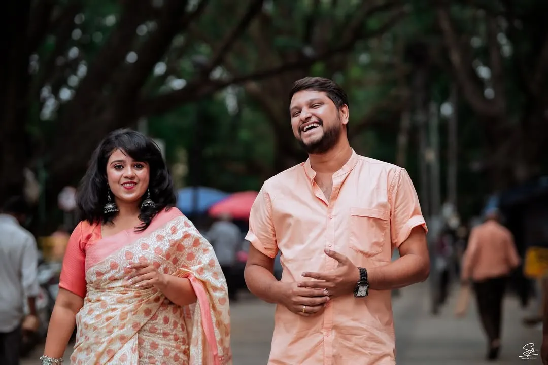 We love capturing the real you. This pre-wedding shoot on a bustling Bangalore street shows that the most beautiful moments are often the unscripted ones, full of genuine laughter and easy companionship.