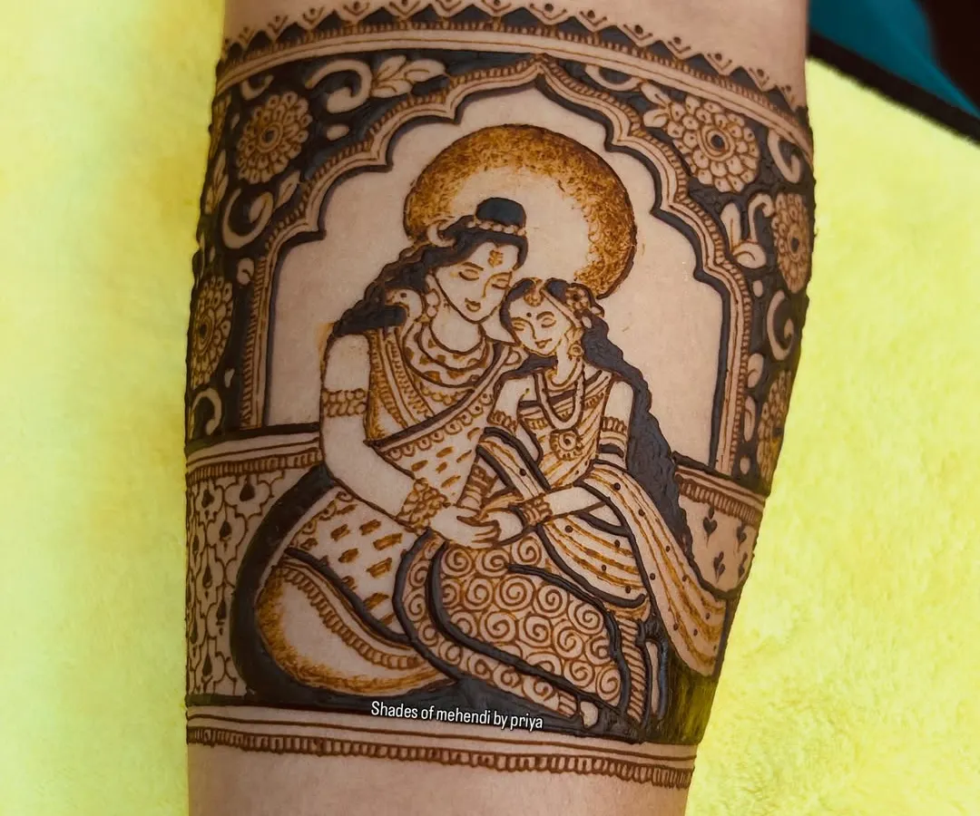 Drawing deities is a special request I cherish. This portrait of Radha-Krishna on the forearm is an example of the fine-line figure work I can do to bring a spiritual element to your bridal henna.