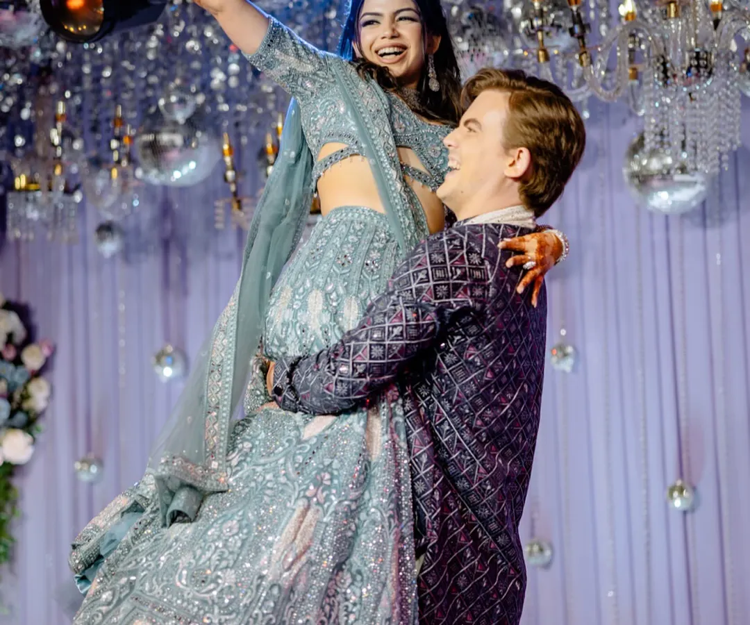 It's the uninhibited joy, the laughter that fills the room, that we live to capture. This lift during the Sangeet isn't just a dance move; it's a memory of pure happiness frozen in time.