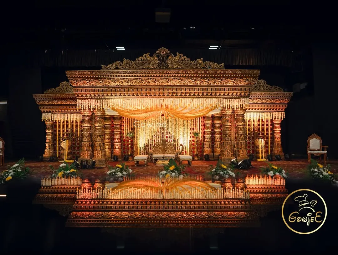 This is where I bring the grandeur of traditional South Indian temple architecture to life. The intricate details, warm lighting, and majestic scale of this mandap created an unforgettable royal wedding experience.