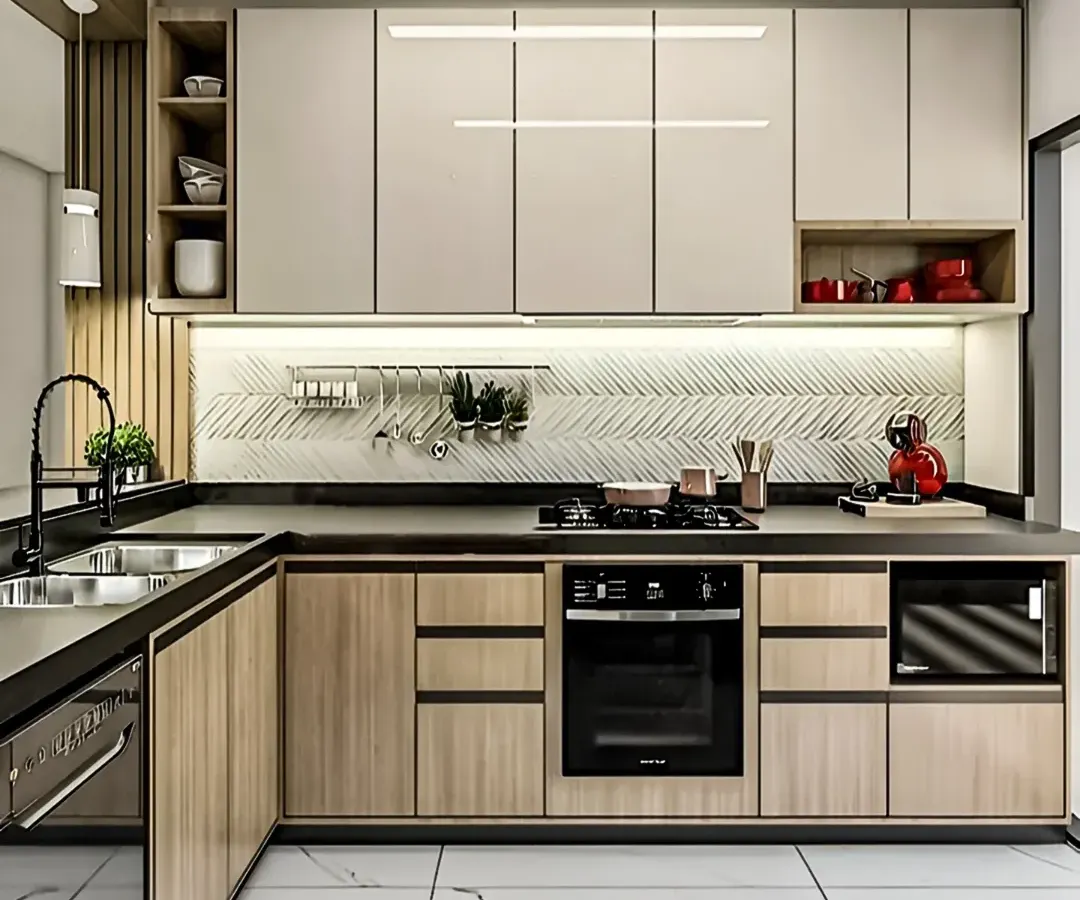This L-shaped modular kitchen combines natural wood-finish lower cabinets with glossy off-white upper units for a balanced, two-tone effect. We installed under-cabinet LED lighting and a textured backsplash to add depth and improve task visibility.