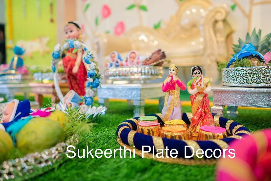 The heart of my decorations is the handmade dolls. Here you can see a close-up of a traditional couple doll set, crafted with attention to detail, which adds a beautiful, personal touch to any ceremony.