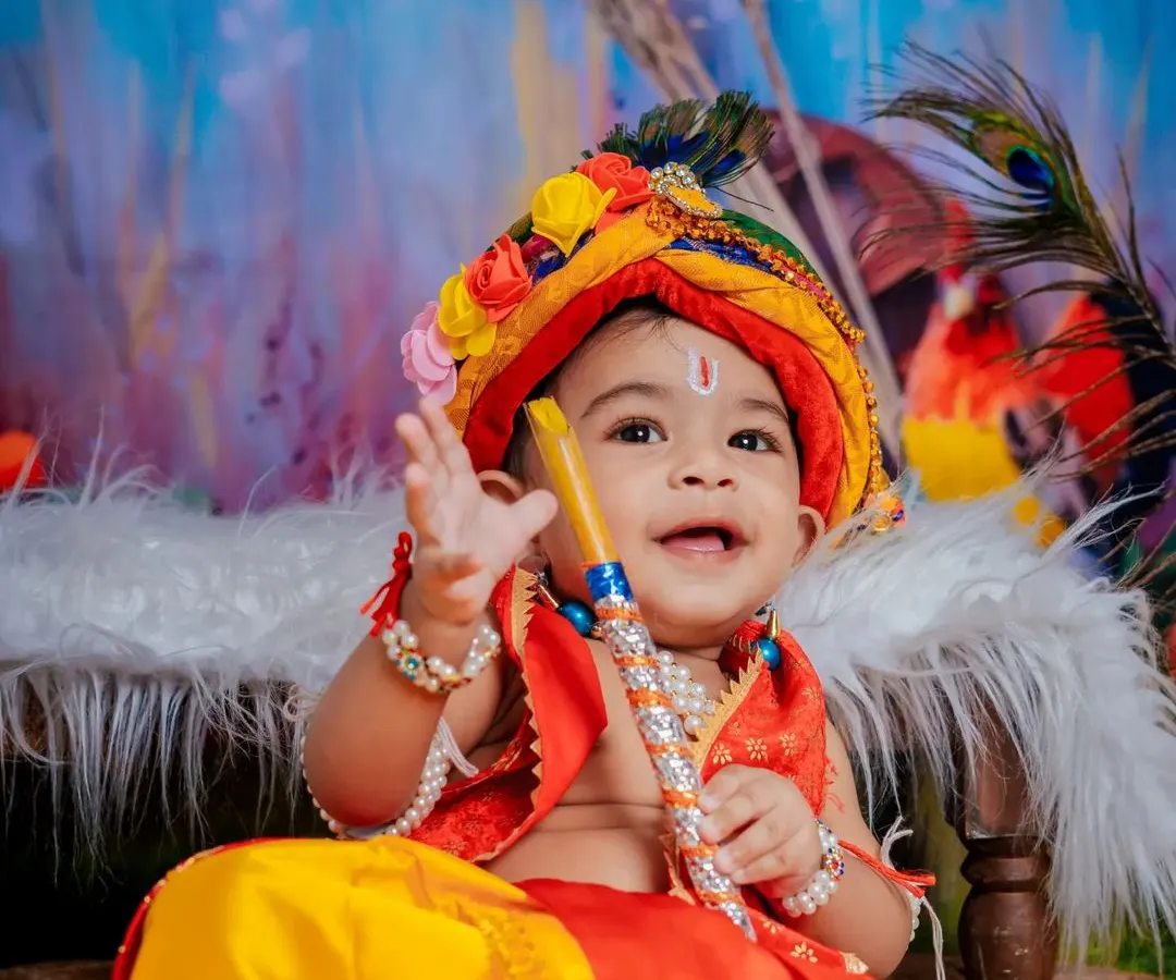 Our little Krishna, bringing so much joy and mischief. We love creating these vibrant, traditional photoshoots that celebrate our culture with a touch of divine cuteness.