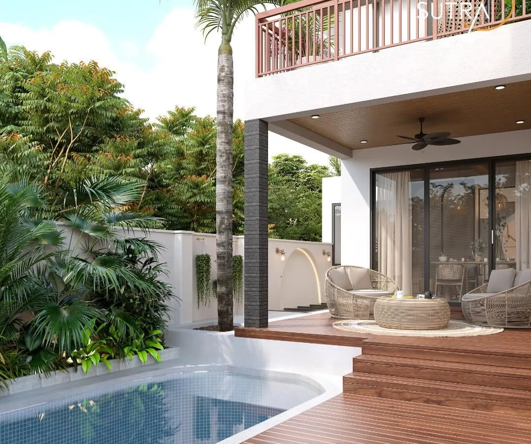 This poolside deck is designed as a private oasis for mindfulness and relaxation. We integrated a tranquil water body with a comfortable seating area and lush tropical foliage, creating a seamless connection to nature. It’s a perfect example of how we design outdoor spaces that function as serene extensions of the home.