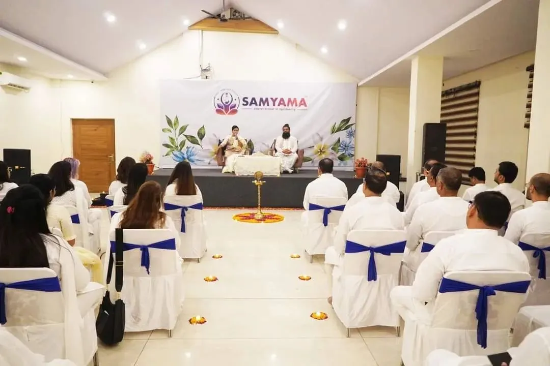 We host spiritual retreats in serene locations like the Himalayas. This gathering in Himachal Pradesh shows our community meditating together, immersed in nature and divine energy, away from the distractions of daily life.