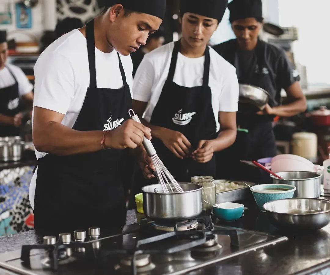 Serious about a culinary career? Our professional programs at the Domlur academy offer intensive, hands-on training in a real-world kitchen environment, guided by expert chefs.