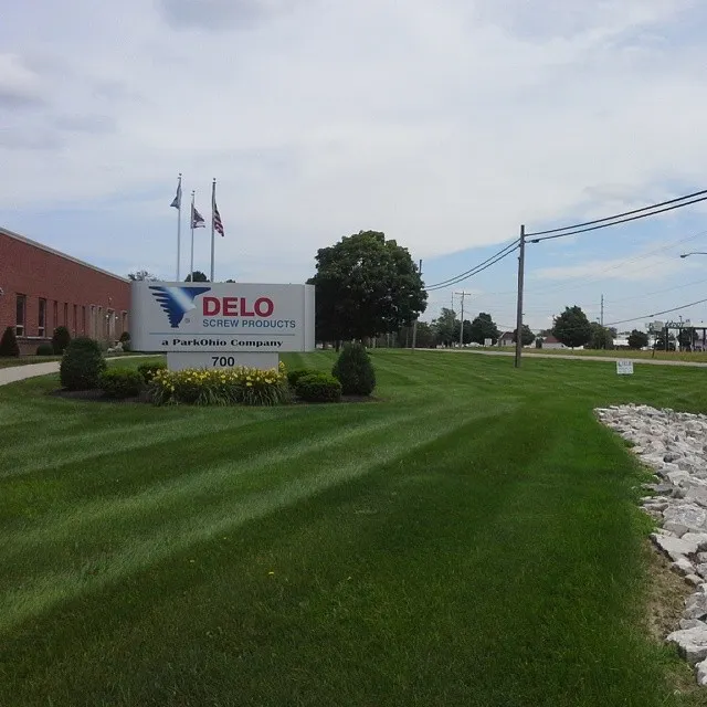 I handle commercial properties too. Here’s a lawn for a local company, looking sharp after a fresh mow. Keeping your business front looking professional is important.