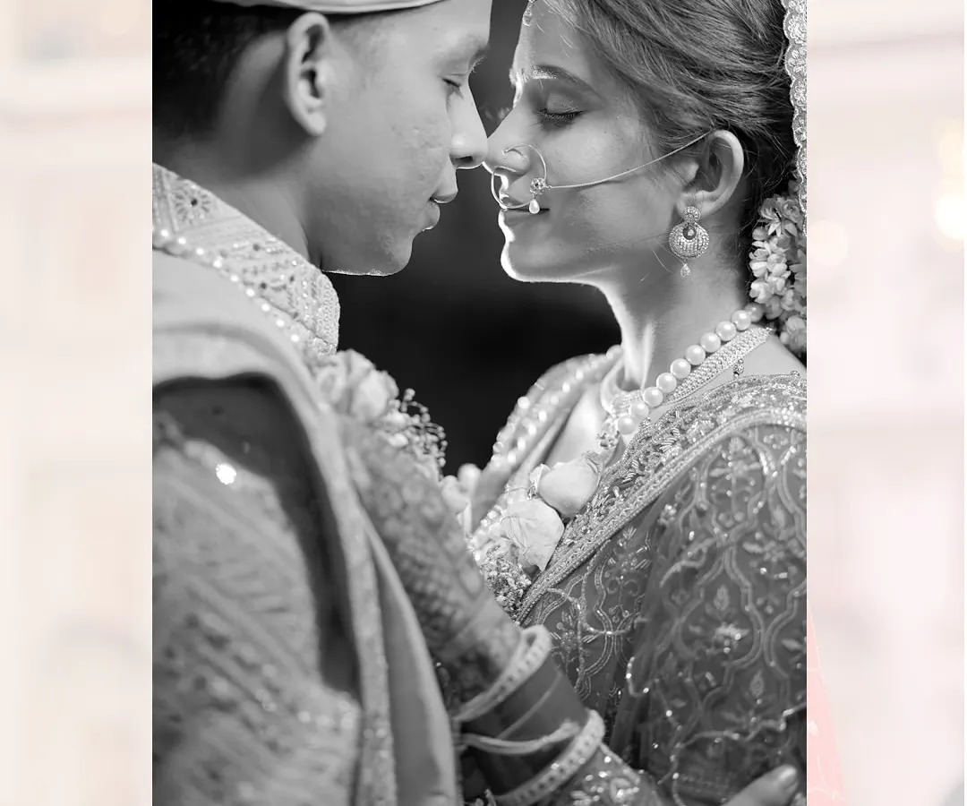 Sometimes, the most powerful moments are the quietest. I use black and white photography to strip away distractions and focus purely on the emotion, like the gentle connection between this bride and groom.
