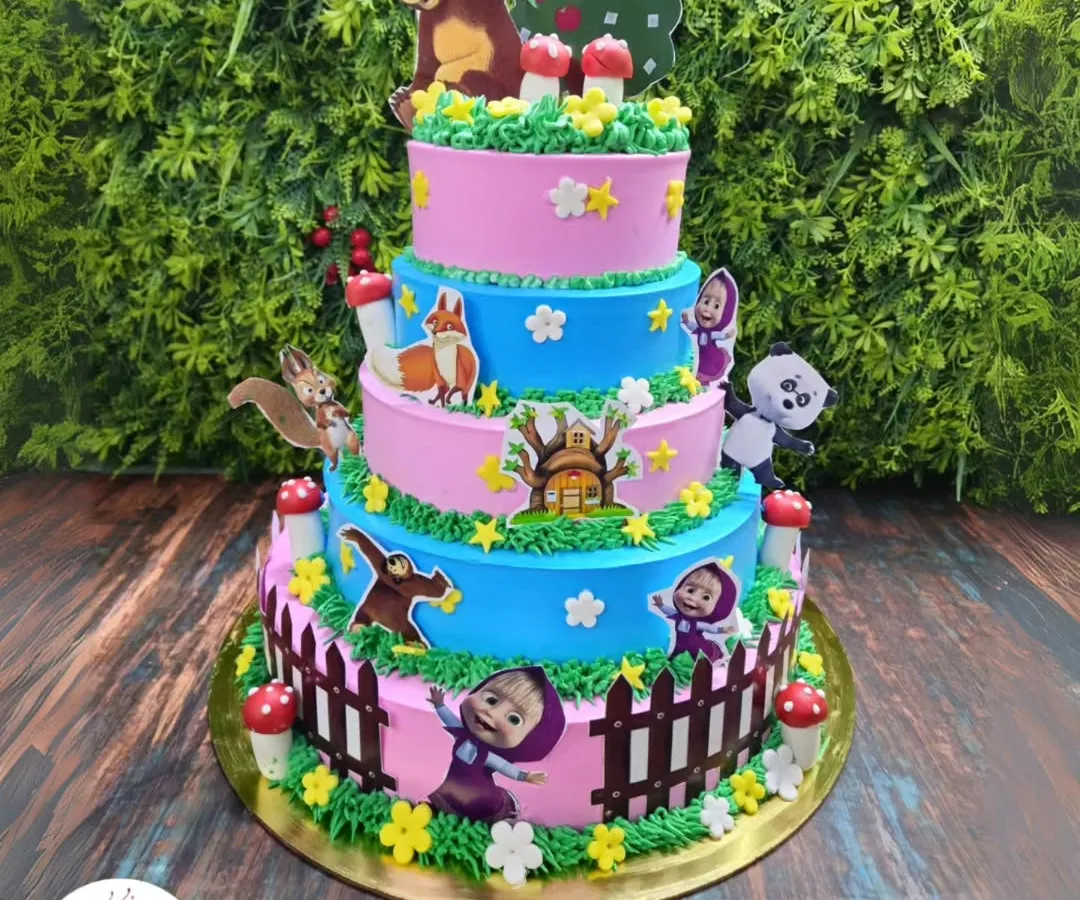 For the little ones who love cartoons, I can make big, multi-level cakes like this Masha and the Bear themed one. It's perfect for large birthday parties and is always a hit with the kids.