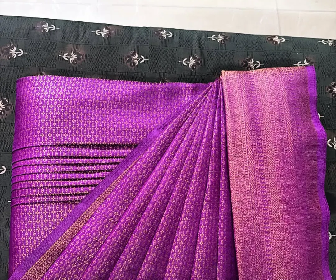 This is the final result of my pre-pleating service on a beautiful purple silk saree. I make sure every pleat is perfectly set and ironed, giving you a crisp and neat look.