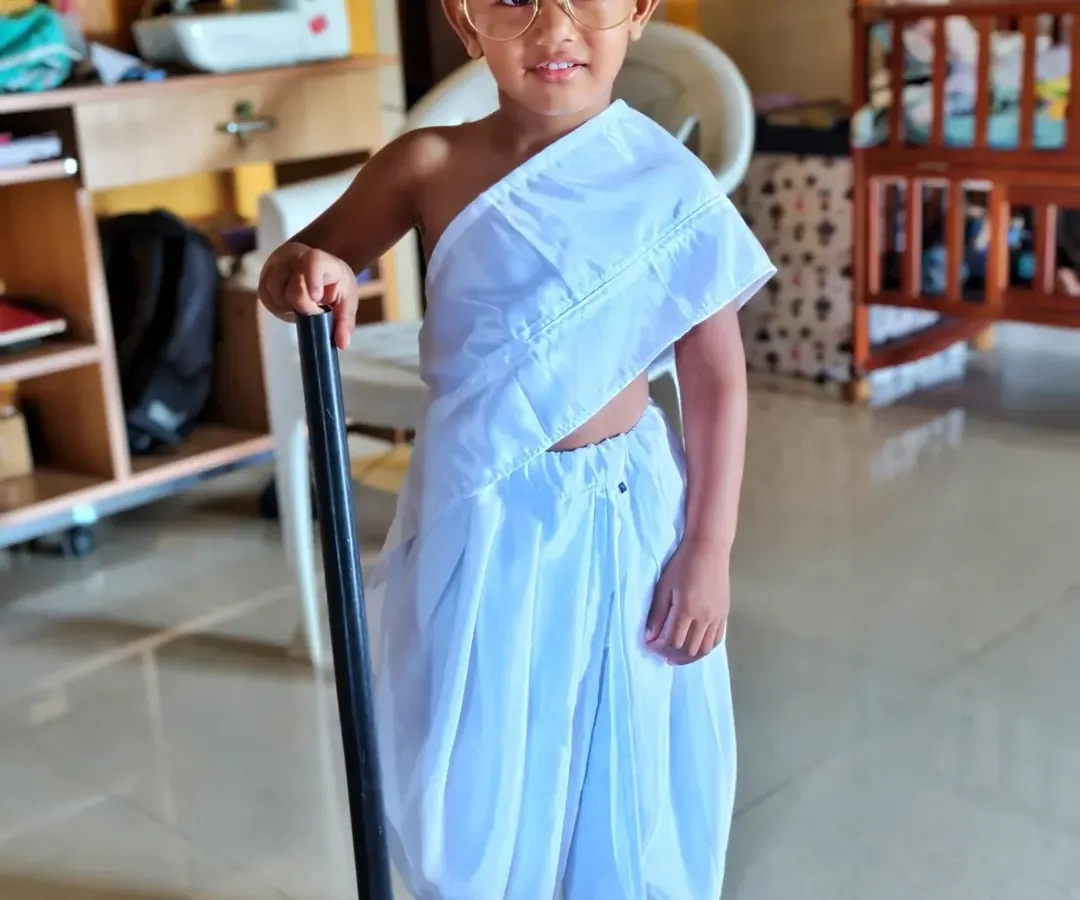 Look at this cute little Gandhiji, all ready for his school event. I provide the complete Mahatma Gandhi fancy dress costume, including the dhoti, shawl, glasses, and stick, so your child can look the part perfectly.