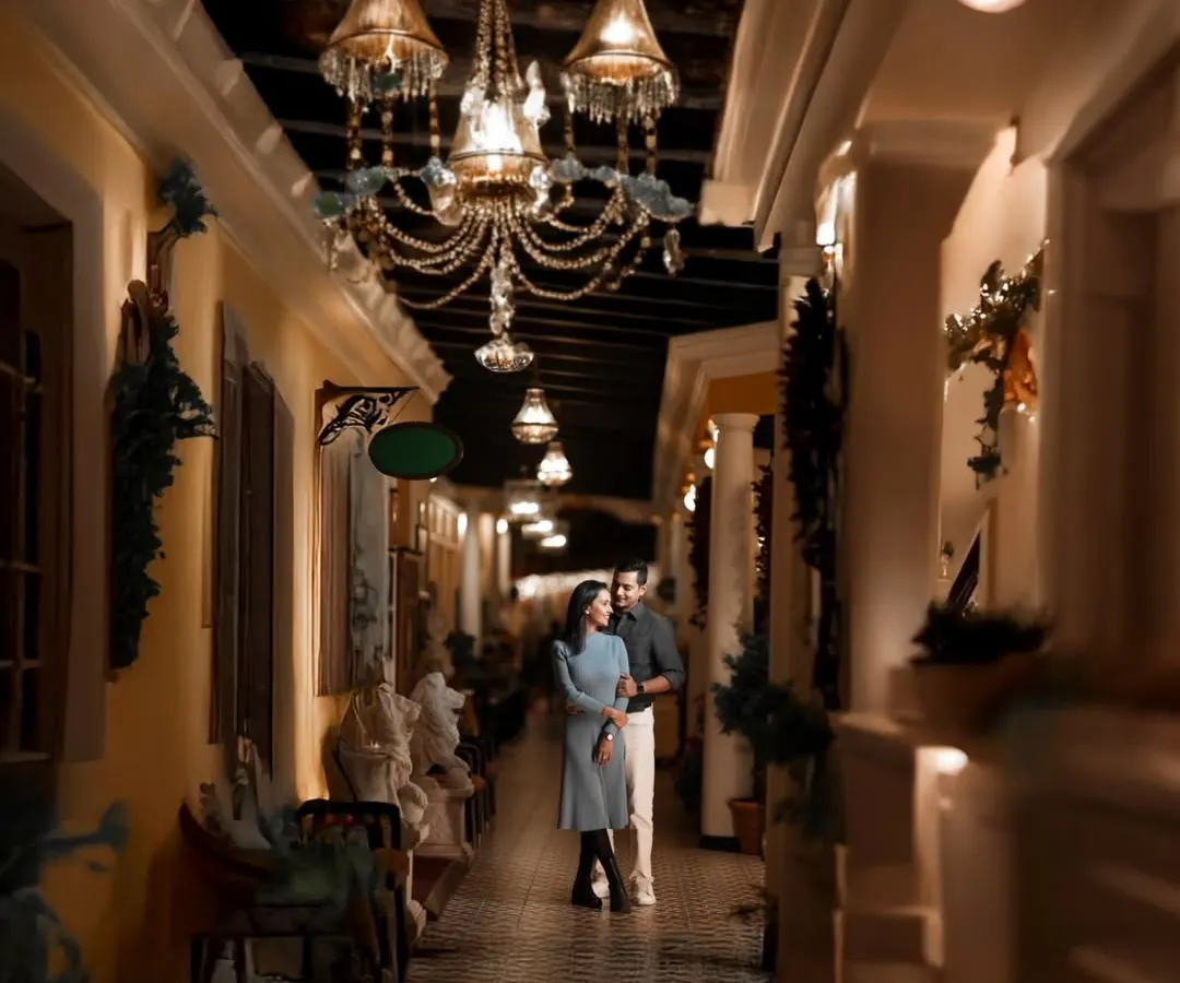 The right location can transport you. This elegant, warmly lit corridor gave Atul and Rachita's pre-wedding shoot a timeless, almost European feel. I love using architectural details and ambient light to create a mood of sophisticated romance.