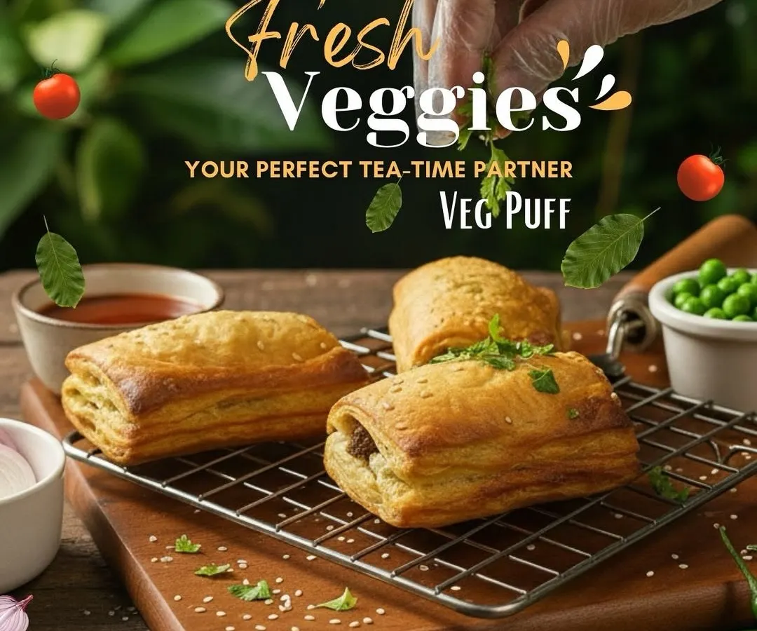 This is our classic Veg Puff, baked to golden perfection. The flaky, buttery pastry gives way to a warm filling of freshly chopped and seasoned vegetables, making it the perfect partner for your afternoon tea.