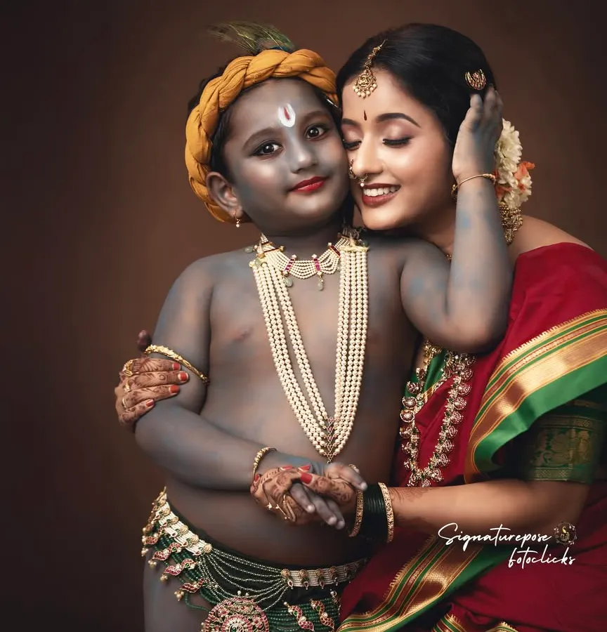 The bond between a mother and child is divine. In this studio portrait, part of my popular Yashoda and Krishna series, I focused on capturing the tender, loving embrace between mother and son. The session includes professional makeup, costumes, and body paint to create an authentic, painting-like feel.