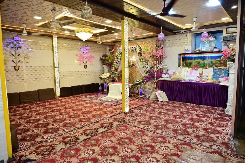 This is a glimpse of our banquet hall, fully decorated and ready for a special occasion. I designed the space to be intimate and elegant, perfect for everything from a Nikah ceremony to a family Jaman, with traditional floor seating that brings everyone together.