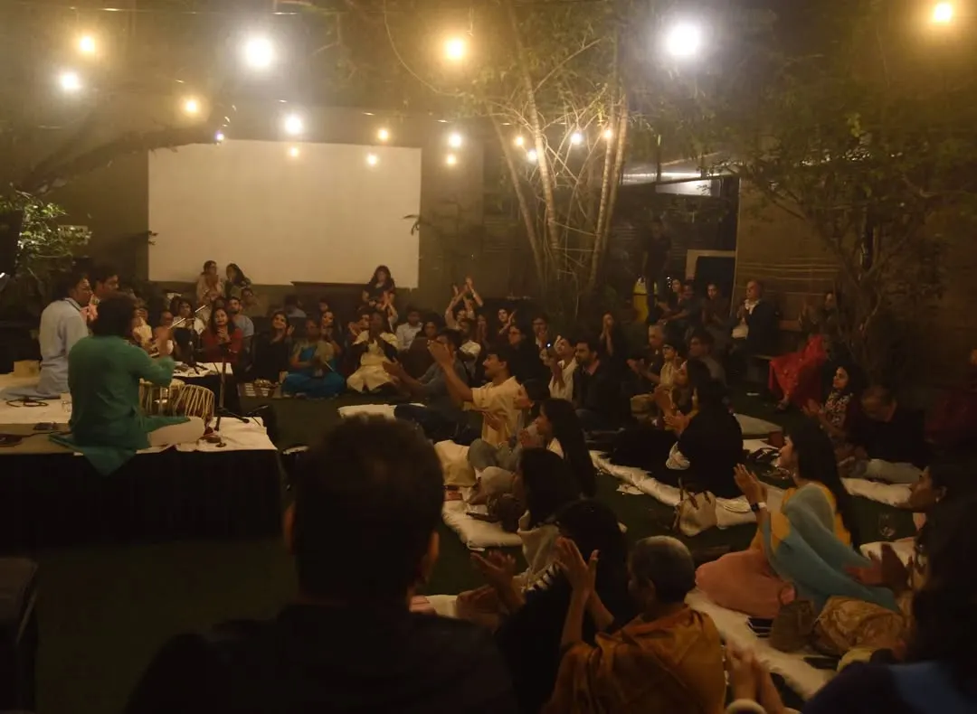 This is the kind of atmosphere I love to create. Everyone sitting together, close to the music, under the warm lights of the courtyard. It’s not a formal concert, it’s a shared experience with artists like Ustad Faiyaz Khan and my brother Sarfaraaz Khan.