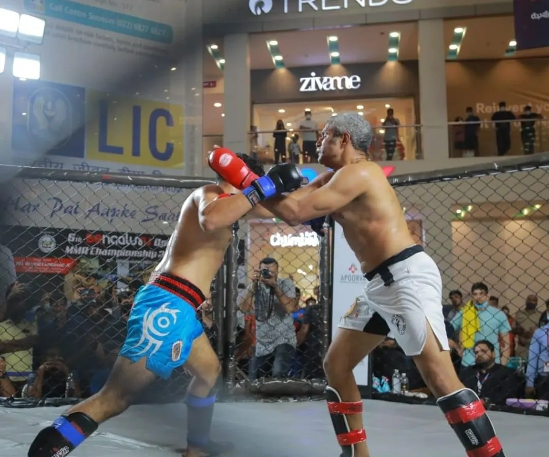 Our founder and head coach, Ashwin Naidu, leads from the front, not the sidelines. This is him competing in the 6th Bengaluru Open MMA Championship, demonstrating the effectiveness of our mixed martial arts training program inside the cage.