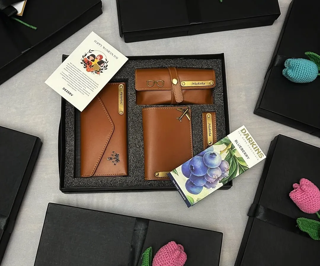We believe corporate gifts should be personal. This bespoke hamper features a set of personalized leather accessories and gourmet treats, showing how we tailor gifts to reflect a company's appreciation and brand.