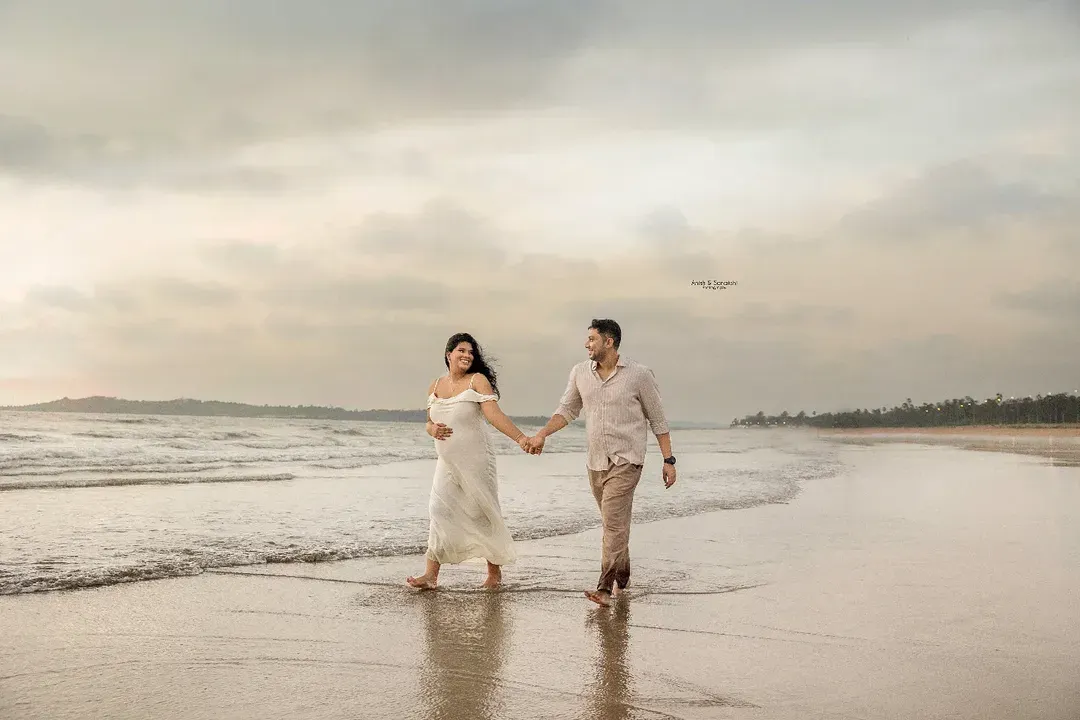 There's something so magical about the anticipation of a new arrival. We captured this serene moment for an expecting couple during a beautiful beach maternity photoshoot.