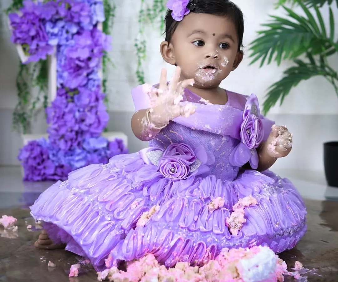 Nothing says "Happy First Birthday" like a cake smash! We love capturing the pure, messy joy as your little one dives into their first cake. This session is all about fun, laughter, and creating delightfully candid memories.