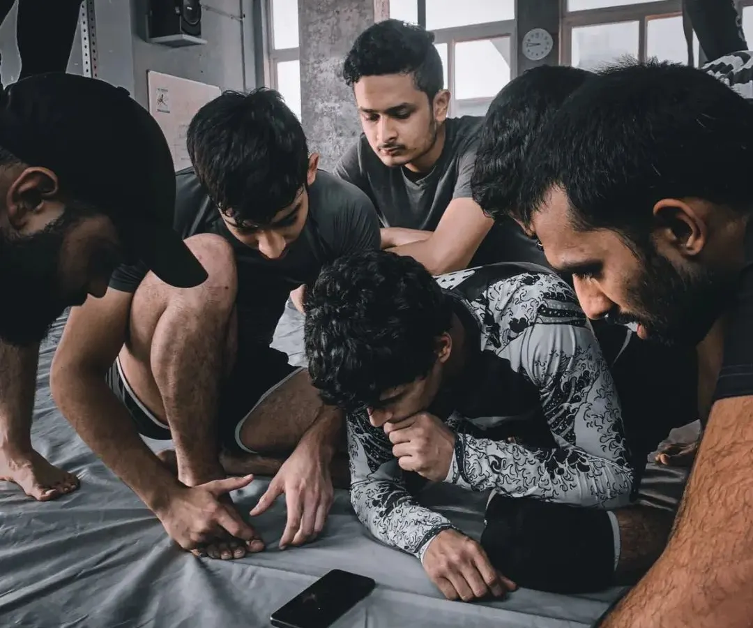 Jiu-jitsu is more than just physical moves; it's a deliberate and detailed study. Here, we are breaking down footage, analyzing techniques, and understanding the 'why' behind every action. This is how you build fight IQ.