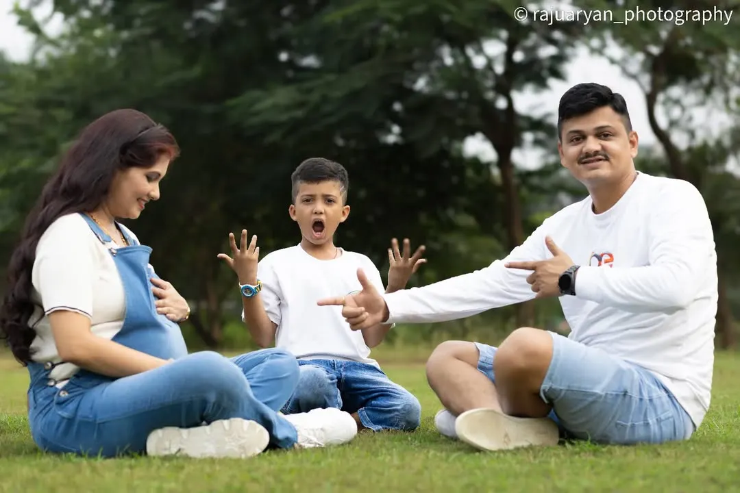 Including the whole family is pure gold. The genuine shock and excitement on the big brother's face is a priceless, unscripted moment that tells a beautiful story. These fun family maternity sessions are perfect for celebrating the new arrival together.
