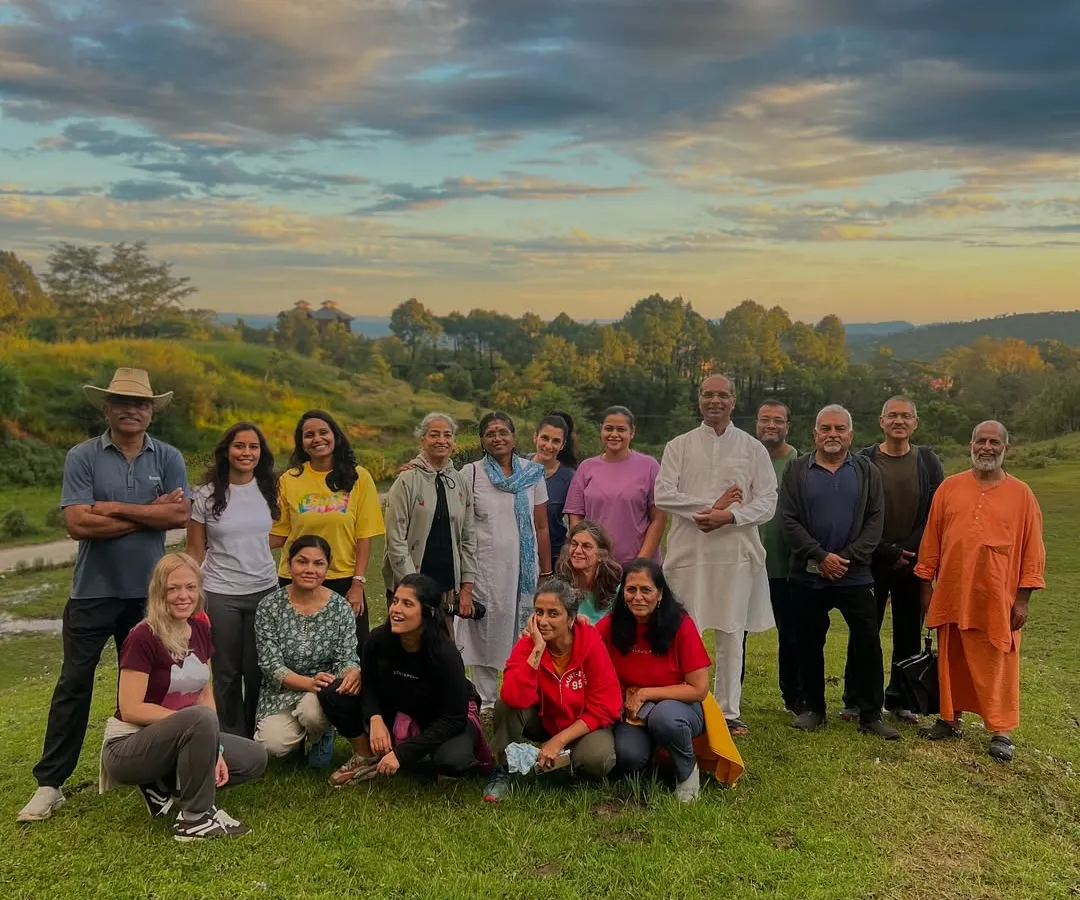 Our sangha, our community, sharing a moment of togetherness against the backdrop of the Palampur mountains. People from all walks of life come as strangers and leave as family after a shared journey of yoga and self-discovery.