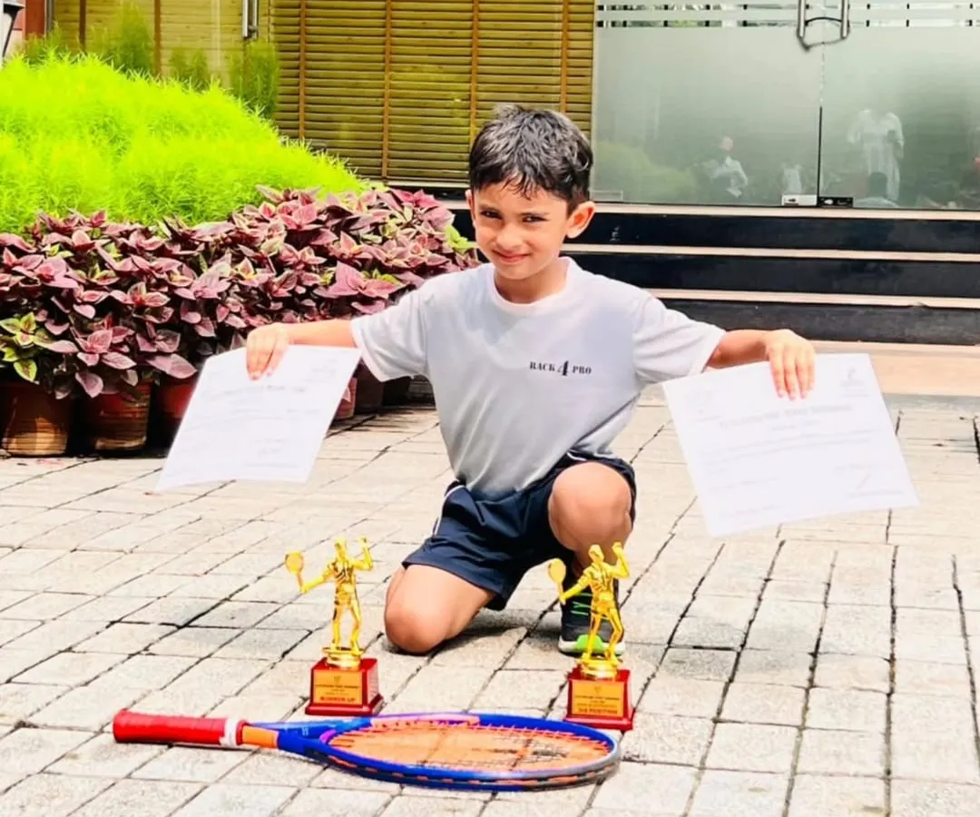 Results are earned, not given. We are incredibly proud of our young tennis player, Naksh Manan, showcasing his trophies after securing 2nd and 3rd place at the DLTA Mini Tennis Open Tournament. This is a testament to his hard work and our dedicated coaching.