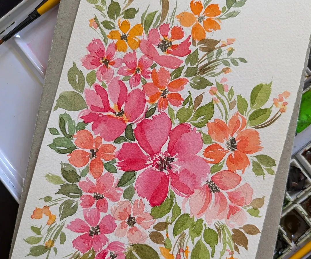 This is one of my favorite loose floral watercolor bouquets. I love getting lost in the flow of colors, creating vibrant arrangements like this one with layers of pink, orange, and green. If you're looking for a custom botanical painting to brighten your space, this is the kind of heartfelt art I create.
