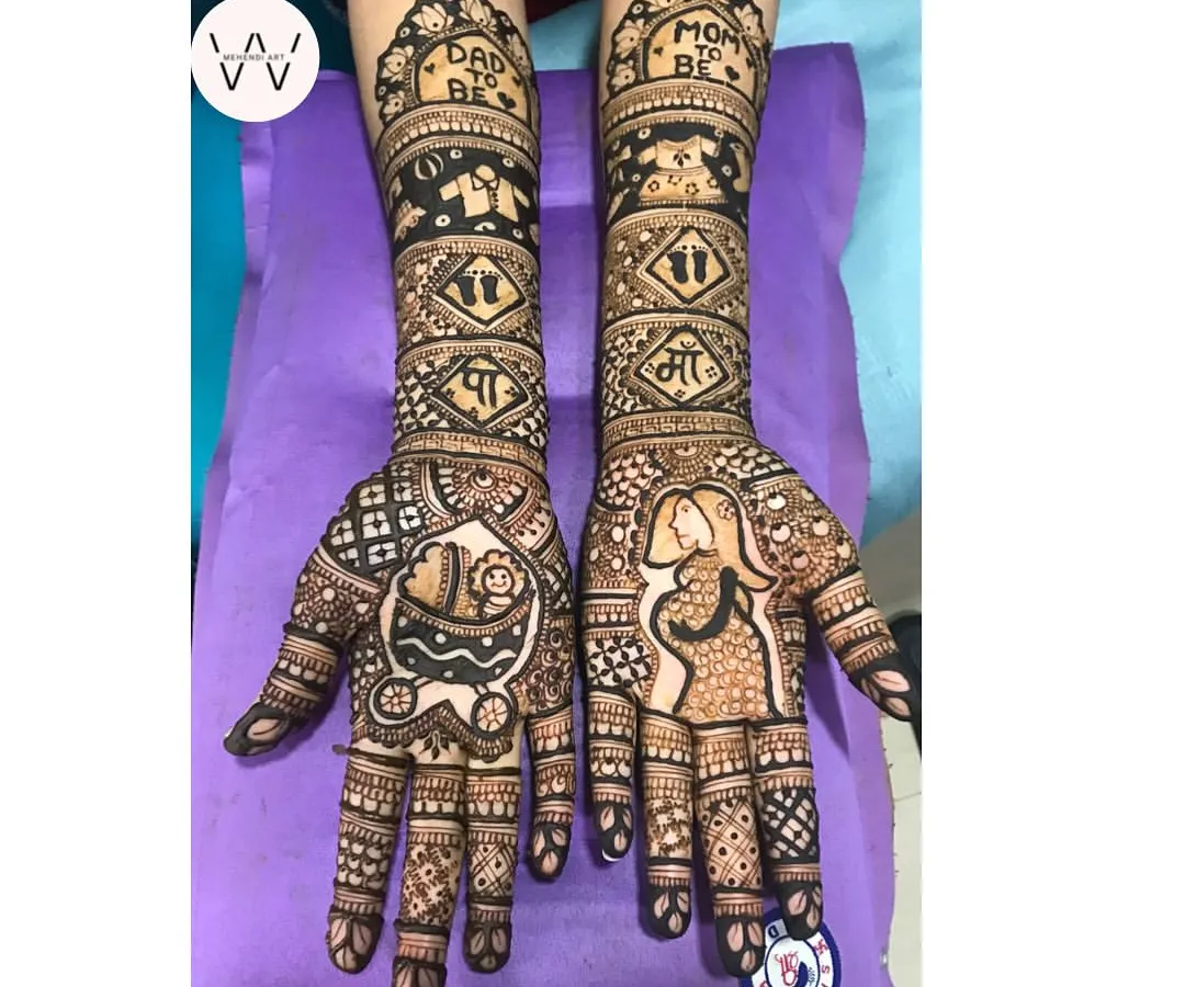 Celebrating a new life is always so special. This baby shower henna is filled with joy, featuring cute motifs like a baby carriage, tiny clothes, and loving "Mom to be" and "Dad to be" messages.