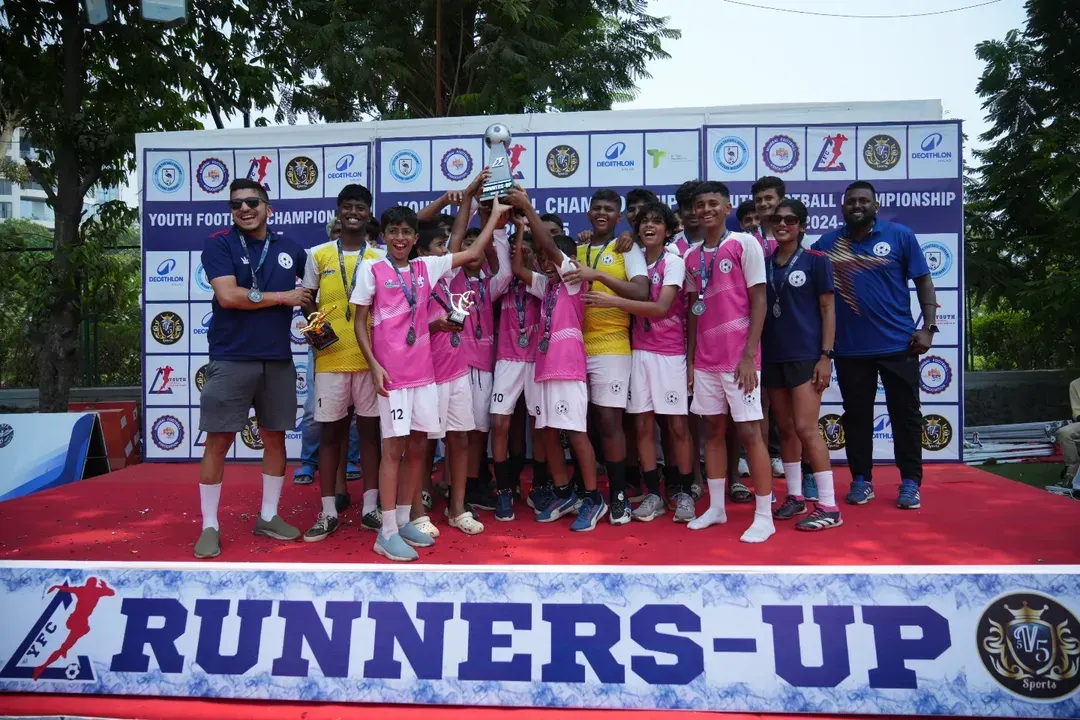 A moment of pure joy and achievement. Our U-15 team celebrates on the podium after being crowned runners-up at the YFC 2024-25 tournament, showcasing the results of their hard work and dedication.