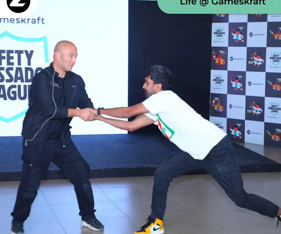 In a corporate setting, I demonstrate how strength is not about size but about technique and leverage. This hands-on drill during a workshop at Gameskraft shows employees how to break a wrist grab, a common form of assault, using simple, effective movements.
