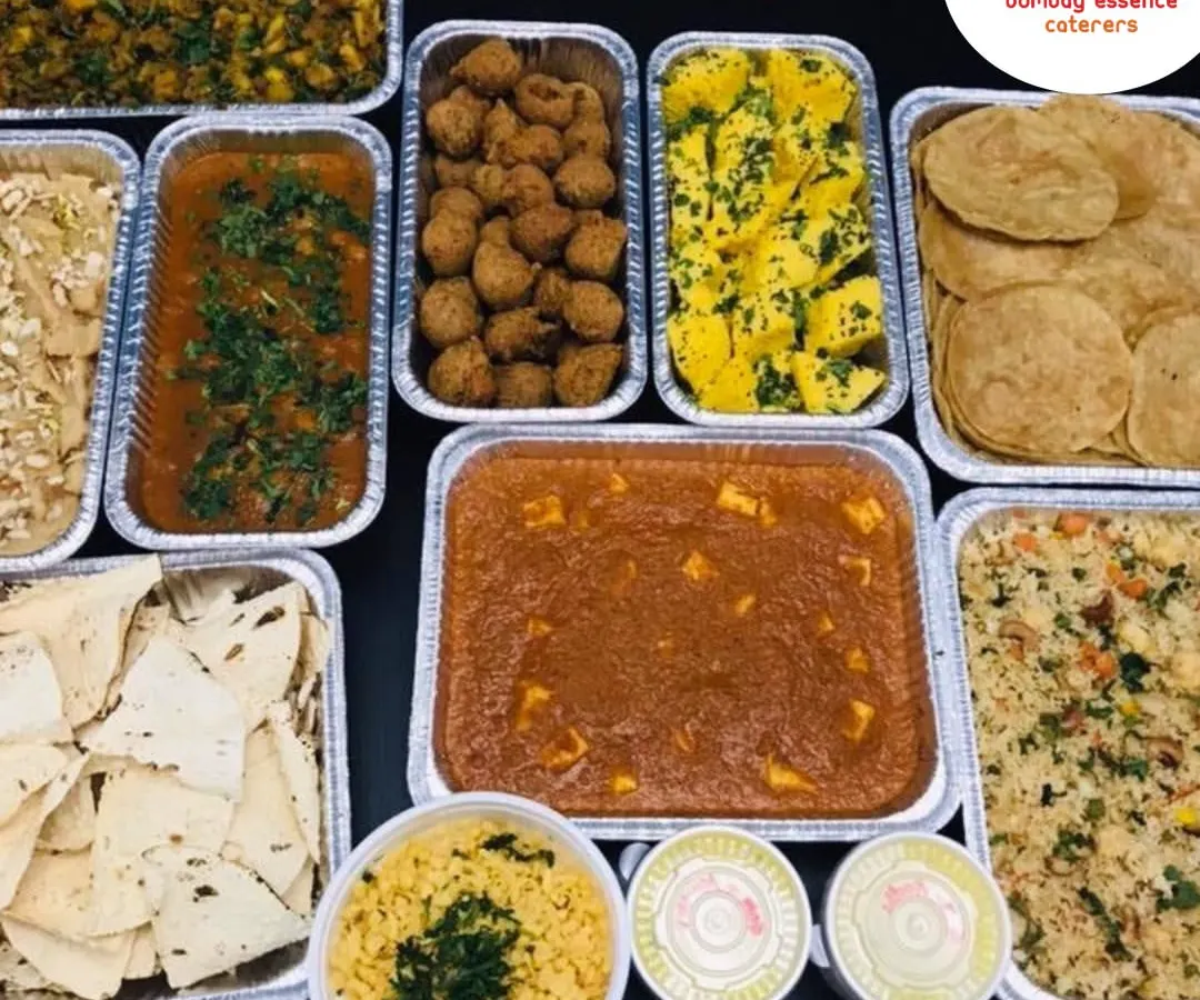 Our bulk food delivery service brings the feast directly to you. This spread, featuring Paneer Butter Masala, Dal, Puris, and more, is perfect for house parties, society events, or any large gathering where great food is a must.