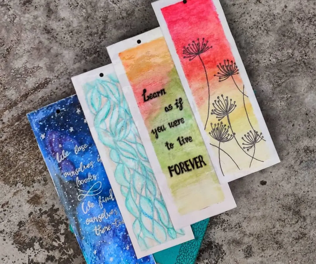 This collection shows the variety of my hand-painted bookmarks. I create designs for every mood, including cosmic galaxy themes, hand-lettered quotes, abstract waves, and delicate floral patterns, all painted on high-quality, textured paper.